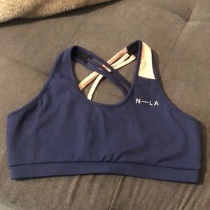 Newd navy sports bra gently used size L